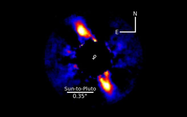 Image of the star HD 115600 (position indicated by a cross) with a bright ring of debris orbiting it. (Image: Thayne Currie) 